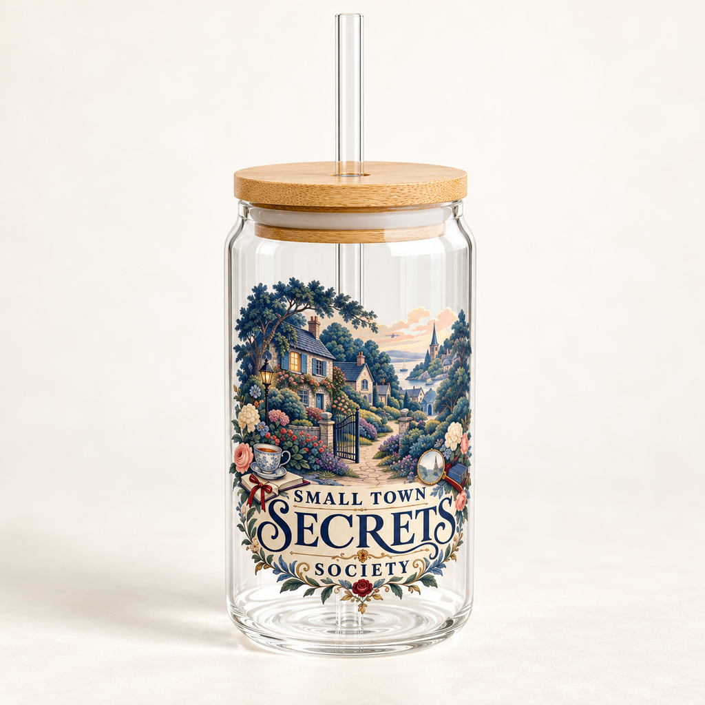 Front view of an empty glass sipper with a bamboo lid and clear straw on a cream background; blue-green cottages, flowers, books and a magnifying glass surround “Small Town Secrets Society.”